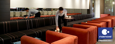 The picture of restaurant staff cleaning fabric sofa.