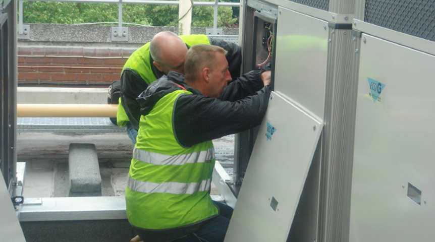 An image of workers installing Panasonic outdoor units
