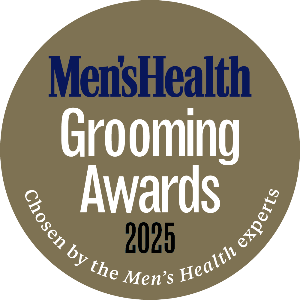 A brown circular badge for 2025 Men’s Health Grooming Awards, labelled “Chosen by the Men’s Health experts” in blue/white/black text.